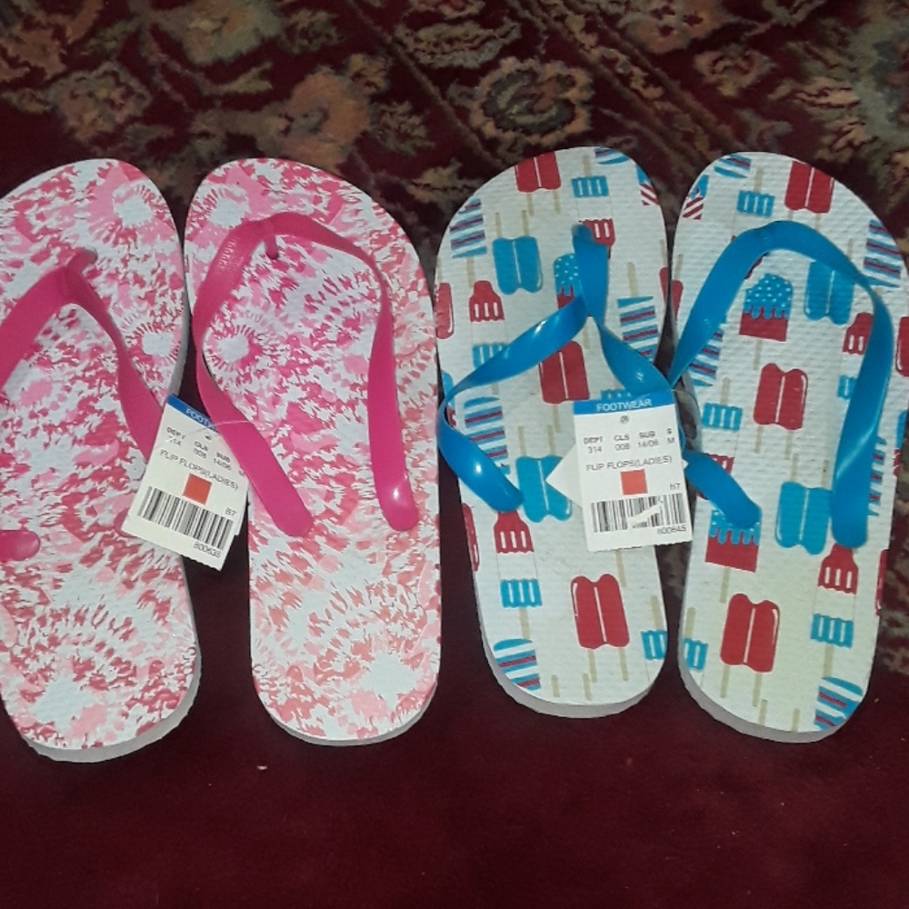 Two pairs of flip flops size medium  7/8